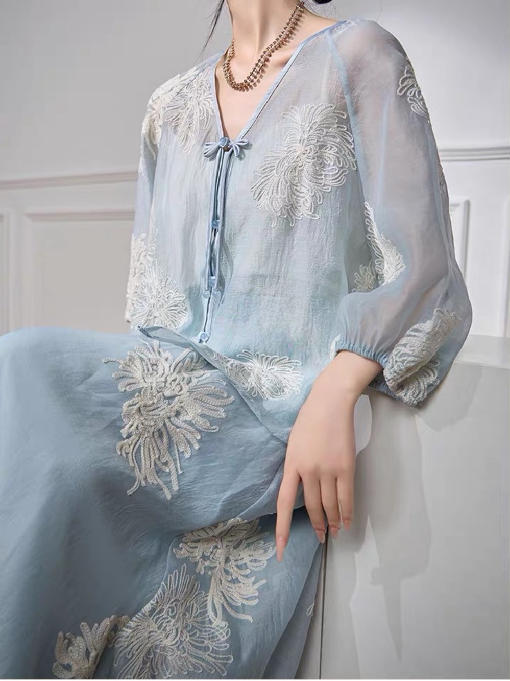 Elegant Women's Light Blue Embroidered V-Neck Blouse and matching skirt SET